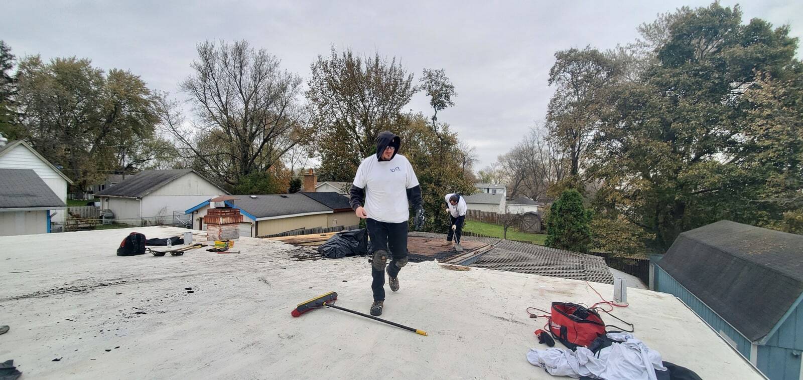 Ryan on a residential flat roof during preparation work